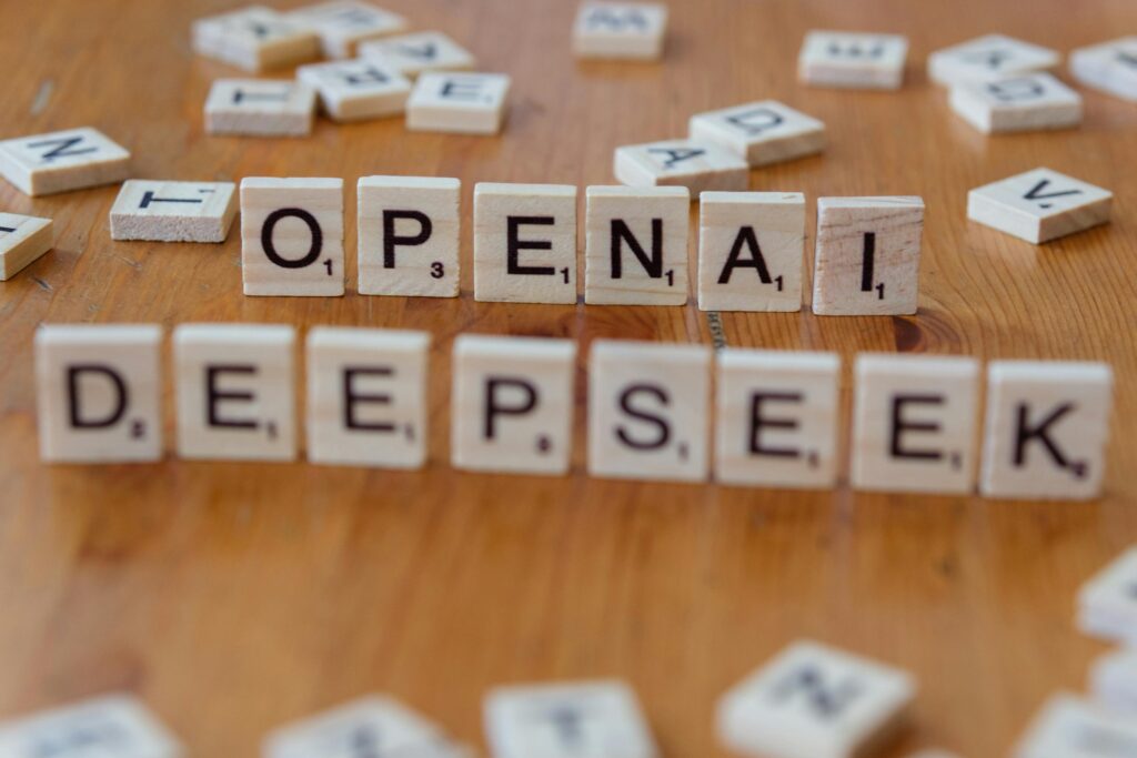 Scrabble tiles spelling openai and deepseek