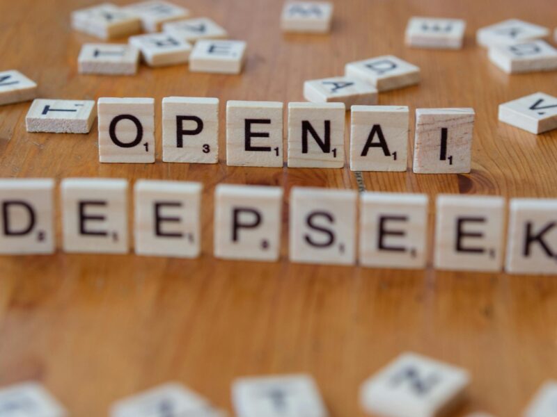 Scrabble tiles spelling openai and deepseek
